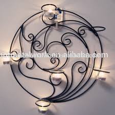 Shop wrought iron candle holders and other wrought iron decorative objects from top sellers around the world at 1stdibs. Decorative Wrought Iron Metal Wall Mounted Round Tea Light Candle Holder Buy Metal Wire Candle Holder Metal Frog Candle Holder Wall Mount Candle Holder Product On Alibaba Com