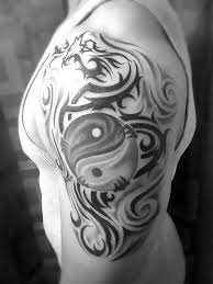 Tribal Ying Yang Tattoo On Shoulder Tattoo Idea Ying Yang Tattoo Yin Yang Tattoos Tattoos For Guys