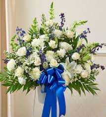A traditional love heart funeral tribute based with white chrysanthemums topped with. Flower Arrangement Delivery To Italian Funeral Homes In Toronto Torontofuneralflowers Com