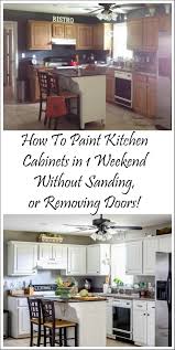 How I Painted My Kitchen Cabinets Without Removing The Doors Painting Kitchen Cabinets White Painting Kitchen Cabinets New Kitchen Cabinets
