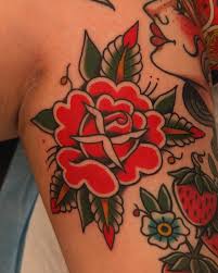 Classic rose drawn to fit ✨🖍️ next to some healed strawbs and lady head  🍓💖 Thanks for the trust, Danna! . . . #rosetattoo #freehandtattoo  #traditionaltattoo #kamloopstattoo #kelownatattoo