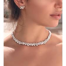 David's bridal offers clean & modern, elegant wedding gowns in lace, beach perfect, short & minimalist dress styles! Bridal Necklace Style Guide Solitaire Jewels Bridal Jewellery Uae