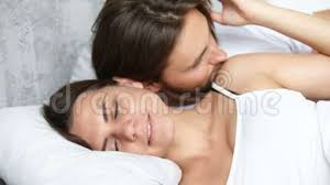 Good morning hug images for wife. Affectionate Husband Wakening Up Sleeping Wife By Kissing Good Morning Stock Footage Video Of Hotel Life 101234784