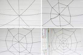 First you want to start with a basic frame of one vertical length of yarn and one horizontal. Easy Diy Halloween Yarn Spider Web