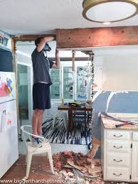 Most are 8 feet high, minimum. Bunkhead Soffit Removal Bigger Than The Three Of Us