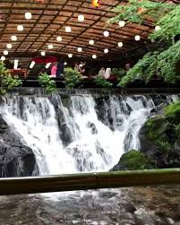Noodles Delivered Via A Bamboo Slide Who Wants To Eat At This Waterfall Restaurant In Kyoto Pu Riverside Restaurant Waterfall Amazing Architecture