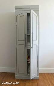 Assemble the pantry cabinet start by attaching the top and bottom shelves to the back. Diy Ballard Designs Knock Off Pantry Cabinet