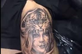 I felt great after the fight, got back in the gym, and hopefully, the next fight will be in december for the title against cruz. Midnight Mania Cody Garbrandt Gets Tattoo Of His Wife S Face In A Tiger Headdress Mmamania Com