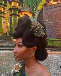 The hair styles of the Emerald City citizens in Wicked, Designed by Francis  Hannon. 💚💛