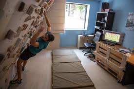 A climbing wall is an artificially constructed wall with grips for hands and feet, usually used for the earliest artificial climbing walls were typically small concrete faces with protrusions made of. Walltopia Happy To See The Walltopia Home Wall Being Put Facebook