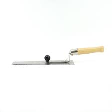 To make a cut, you feed the plank lengthwise through the blade, line up the cut line with the blade and push down on the handle. Florcraft 12 Laminate Undercut Saw At Menards
