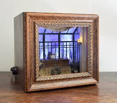 Model Maker Recreates Eerie Scenes In Miniature Within Shadow Boxes