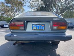 Image result for Light Silver 1985 Alfa-Romeo