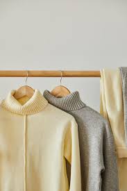 Choose from various styles, colors & shapes. Beige And Grey Knitted Soft Sweaters Hanging On Wooden Hangers Isolated On White Free Stock Photo And Image
