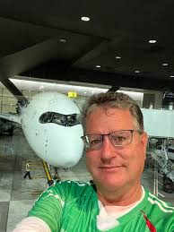 At San Francisco International Airport boarding a Lufthansa plane to Munich.