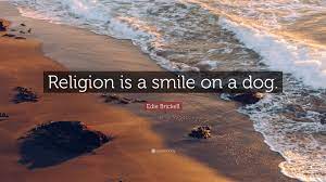 Edie Brickell Quote: “Religion is a smile on a dog.”