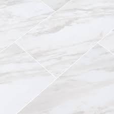 This tile is not currently available in different shapes however it can be cut to. Home Decorators Collection Kolasus White 12 In X 24 In Polished Porcelain Floor And Wall Tile 16 Sq Ft Case Nhdkolwhi1224p The Home Depot Porcelain Flooring Flooring White Porcelain Tile