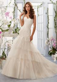 Mermaid wedding dresses are quite popular among bride. This Strapless Mori Lee 5405 Fit And Flare Wedding Dress Features A Dropped Waist Asymmetrically Ruc Mori Lee Wedding Dress Designer Bridal Gowns Bridal Gowns
