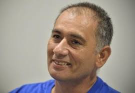 At home and cured of Ebola, Cuban doctor vows return to Africa