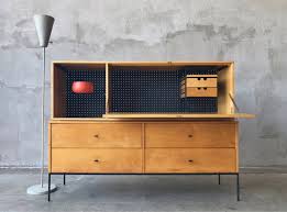 Its multiple drawers and drop lid create. Reserved