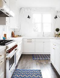 Windows behind kitchen sinks are easy to decorate too! Kitchen Sink Window Decorating Ideas Apartment Therapy