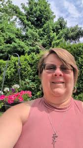 Miss Eva Santee at the library.