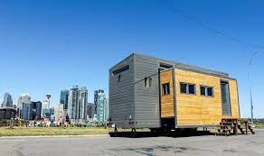 Built By Zerosquared The Aurora Features Two Large Slide Outs That Transform The 26 Foot Tiny Home Fr Tiny House Community Best Tiny House Tiny House Exterior