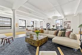 Custom curved bamboo banquette and with kravet upholstery compliment the color. Kelly Bensimon Lists A Chic Greenwich Village Duplex Loft