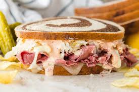 Then, add the rest of the swiss cheese and the rest of the bread slices (buttered side up). Reuben Sandwich With Homemade Russian Dressing Natashaskitchen Com