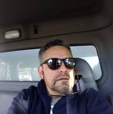 Fuego Volcano and Chicken Bus in Alotenango, Guatemala