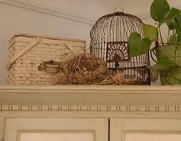 Nonetheless, you don't need a bird to make a. Decorating With Bird Cages And Other Bird Inspired Accessories Bird Cages Bird Cage Decor Kitchen Cabinets Decor
