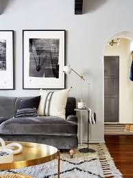 6 Paint Colors That Make A Room Look Bigger Gold Living Room Black And Gold Living Room Living Room Makeover
