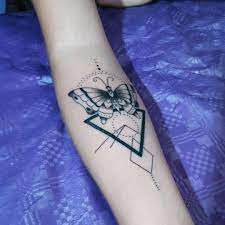 40 Unique Triangle Tattoo Meaning And Designs For Dreamers Geometric Tattoo Simple Geometric Triangle Tattoo Triangle Tattoo Design