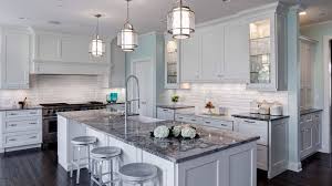 Since this design can be stretched along the length of the kitchen work surface, it can make any countertop look longer. White Kitchen Cabinets With Dark Grey Granite Countertops Anipinan Kitchen