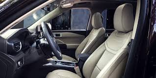 Recline seats, trailer reverse guidance, interior work surface, boxlink with locking cleats, and stowable loading ramps. 2021 Ford Explorer