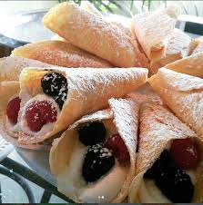 The name behind this dessert comes from a story dating back to the 1800s. Krumkake Recipe Traditional Norwegian Desserts Recipe Krumkake Recipe Recipes Norwegian Krumkake