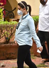 The pregnant bollywood actress flaunted her baby bump in a green salwar kameez. Mom To Be Kareena Kapoor Khan Proves Her Love For Denim In A Classic Shirt Leggings Combo Vogue India