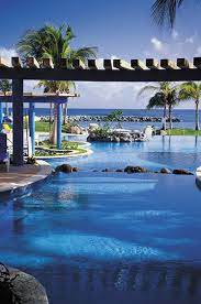 10 Best Embassy Suites Pools Beachfront Pool Embassy Suites Dorado Del Mar Beach Resort Dorado Puerto Rico Puerto Rico Trip Dream Vacations Resort