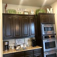 49 Gorgeous Farmhouse Gray Kitchen Cabinet Design Ideas In 2020 Kitchen Cabinets Decor Decorating Above Kitchen Cabinets Above Kitchen Cabinets