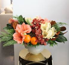 Make A Statement At Your Holiday Brunch Or Send Well Wishes For The New Year Citrus Radiance By Win Winston Flowers Fresh Flowers Arrangements Hotel Flowers
