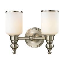 Attached to the bar are two rounded arms that connect to open bulb sockets. Vanity Light