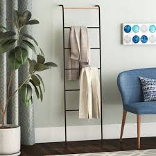 Use all the available space, from the top of the closet to the floor, and if there's room, hang a towel rack with multiple rods or additional shelving on the back of the closet door. 10 Best Wall Ladders For Keeping Clothes Organized 2020 The Strategist