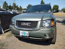 Image result for Silver Green 2003 Envoy
