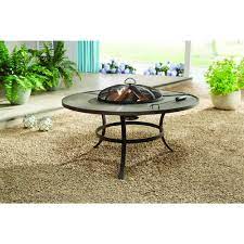 Enjoy a bite to eat outdoors with your loved ones beside a blazing flame. Hampton Bay 42 In Round Wood Burning Fire Pit Cocktail Table With Pok Decohub Home Outlet Store