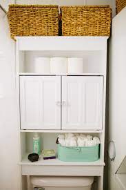Use it to hang a towel or two and to add baskets for other things. How To Reinvent Your Bathroom With Over The Toilet Shelves
