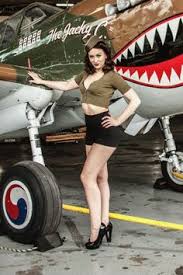 Some pin up girls and some were dressed just in military uniforms. Pinup Aircraft