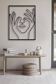 This piece of wall decor is perfect for adding color to your living room, bedroom, bathroom, entryway, or dining room. Single Line Wall Decorwall Decor Hand On Face Wall Art Etsy In 2021 Wall Art Decor Living Room Metal Wall Art Living Room Wall Art Living Room