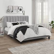 With a lofty headboard that adds extra drama to solid wood legs in an espresso finish. Glam Upholstered Platform Bed