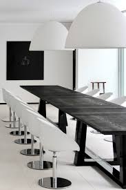 10 Gorgeous Black Dining Tables For Your Modern Dining Room Minimalist Dining Room Interior Design Dining Room Dining Room Interiors