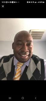 Coltness at Greggs. I took the photos after seeing a woman with a buggy and  pre schooler walk round the car to get to the shop, at that point vehicles  were parked